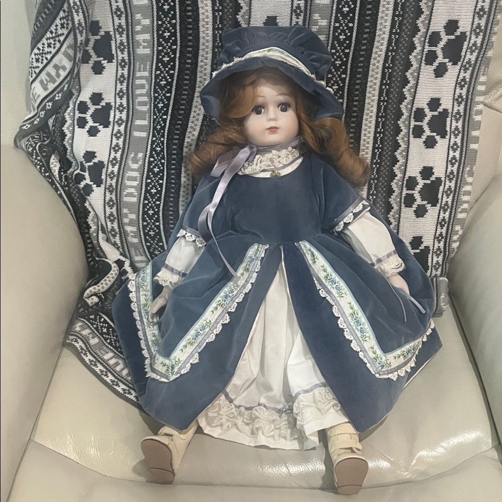 Elegant Blue and White Doll with Hat